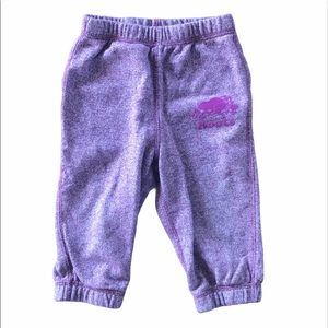 Roots purple logo on bottom sweatpants